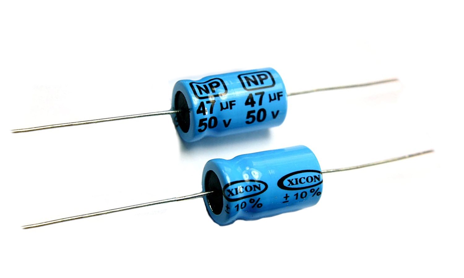 Two non-polarized capacitors